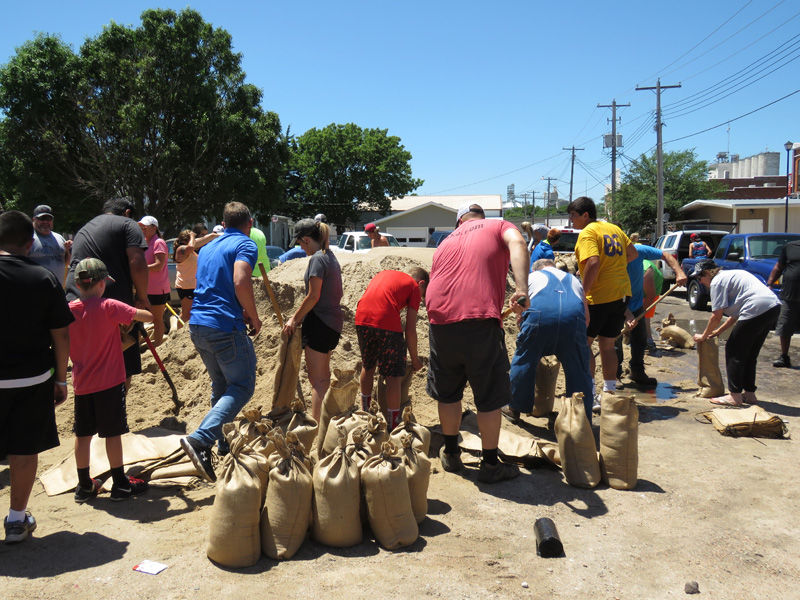 Filling sandbags in Gibbon